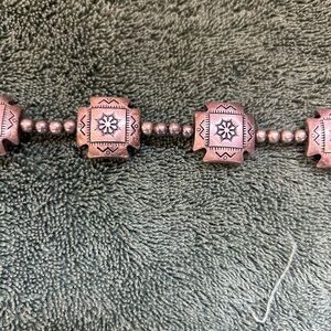 Silver beaded necklace with engravings